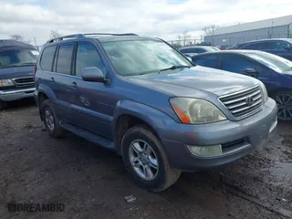 2003 Lexus GX 470 with VIN JTJBT20X830006106, listed as a IAAI auction lot 41520749 with 264,413 mi miles. Bid and sale history available at carsss.com. Image 1.