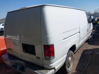 2001 Ford Econoline Cargo with VIN 1FTNE24L11HA65062, listed as a IAAI auction lot 41872072 with 456,684 mi miles and . Bid and sale history available at DreamBid. Image 4.