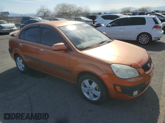2009 Kia Rio SX with VIN KNADE223496514284, listed as a Copart auction lot 48550105 with 114,411 mi miles and Salvage Title. Bid and sale history available at carsss.com. Image 4.