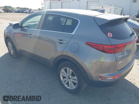 2017 Kia Sportage LX with VIN KNDPM3AC7H7166208, listed as a IAAI auction lot 41910485 with 100,211 mi miles. Bid and sale history available at carsss.com. Image 3.