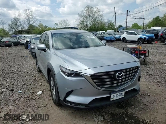 2016 Mazda CX-9 Touring z VIN JM3TCBCY0G0120898, wystawiony jako Copart lot #53628085 z przebiegiem 108 066 mil mil oraz Szkoda całkowita • Salvage title. Historia ofert i sprzedaży dostępna na DreamBid. Obrazek 14.