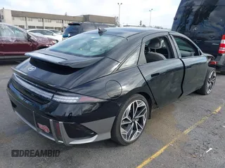 2023 Hyundai IONIQ 6 SEL with VIN KMHM34AA6PA030658, listed as a IAAI auction lot 41271375 with 19,544 mi miles. Bid and sale history available at carsss.com. Image 4.