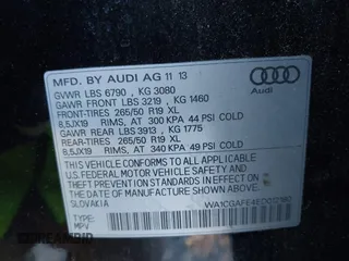 2014 Audi Q7 3.0T Premium with VIN WA1CGAFE4ED012180, listed as a IAAI auction lot 41134033 with 136,002 mi miles. Bid and sale history available at carsss.com. Image 9.