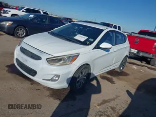 2015 Hyundai Accent Sport with VIN KMHCU5AE9FU205662, listed as a IAAI auction lot 41384496 with 80,133 mi miles. Bid and sale history available at carsss.com. Image 2.