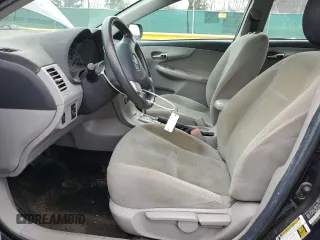 2012 Toyota Corolla L with VIN 2T1BU4EE2CC765245, listed as a Copart auction lot 52449945 with 152,557 mi miles and Salvage Title. Bid and sale history available at DreamBid. Image 7.