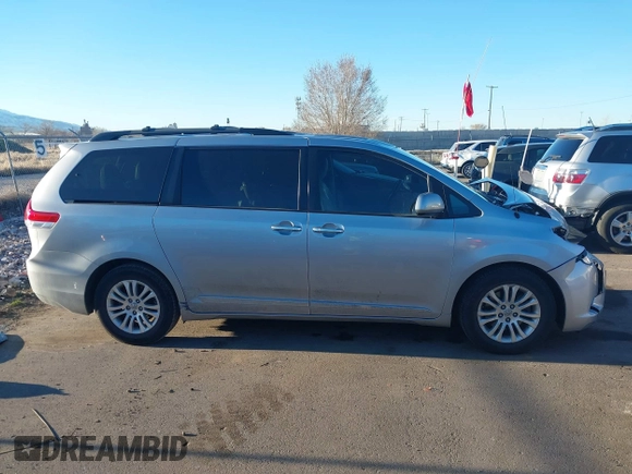 2014 Toyota Sienna XLE z VIN 5TDYK3DC9ES508300, wystawiony jako IAAI lot #41867307 z przebiegiem 93 798 mil mil oraz . Historia ofert i sprzedaży dostępna na DreamBid. Obrazek 13.