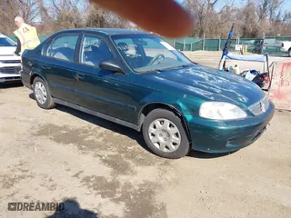 2000 Honda Civic VP with VIN 2HGEJ6615YH579906, listed as a IAAI auction lot 41683779 with 159,701 mi miles. Bid and sale history available at carsss.com. Image 1.