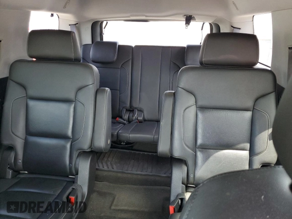 2015 Chevrolet Tahoe LTZ with VIN 1GNSKCKC9FR698924, listed as a Copart auction lot 56196895 with 184,740 mi miles and Salvage title. Bid and sale history available at DreamBid. Image 10.