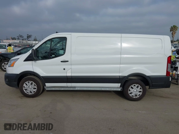 2021 Ford Transit Cargo with VIN 1FTBR1Y85MKA69355, listed as a IAAI auction lot 42544780 with 33,288 mi miles and . Bid and sale history available at DreamBid. Image 14.