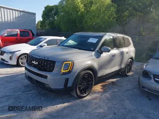 2022 Kia Telluride SX z VIN 5XYP5DHC0NG212114, wystawiony jako IAAI lot #42115082 z przebiegiem 67 071 mil mil oraz . Historia ofert i sprzedaży dostępna na DreamBid. Obrazek 2.