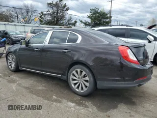 2013 Lincoln MKS with VIN 1LNHL9DKXDG601256, listed as a Copart auction lot 51078365 with 210,644 mi miles and Salvage Title. Bid and sale history available at carsss.com. Image 2.