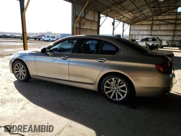 2015 BMW 5 Series 535i with VIN WBA5B1C50FG126420, listed as a Copart auction lot 47316025 with 132,004 mi miles and Salvage Title. Bid and sale history available at carsss.com. Image 2.