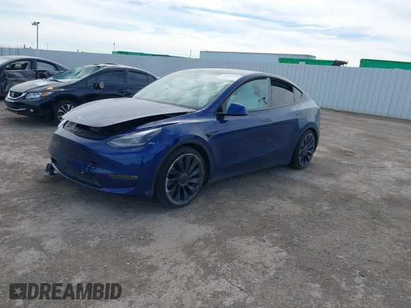 2021 Tesla Model Y Performance z VIN 5YJYGDEF8MF245641, wystawiony jako IAAI lot #41685230 z przebiegiem 25 903 mil mil oraz . Historia ofert i sprzedaży dostępna na DreamBid. Obrazek 18.
