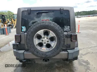2016 Jeep Wrangler Unlimited Sahara с VIN 1C4BJWEG5GL221827, выставлен на аукционе Copart как лот 60411625 с пробегом 65 405 миль миль и Списание • Salvage title. История ставок и продаж доступна на DreamBid. Изображение 6.