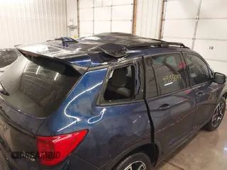 2022 Honda Passport Elite z VIN 5FNYF8H05NB013145, wystawiony jako IAAI lot #41355097 z przebiegiem 45 615 mil mil oraz . Historia ofert i sprzedaży dostępna na DreamBid. Obrazek 13.