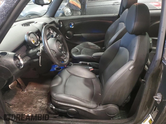 2013 MINI Hardtop S with VIN WMWSV3C53DT390693, listed as a Copart auction lot 44827925 with 131,411 mi miles and Salvage Title. Bid and sale history available at DreamBid. Image 7.