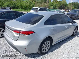 2022 Toyota Corolla LE with VIN JTDEPMAE0NJ195988, listed as a IAAI auction lot 41485618 with 238,890 mi miles. Bid and sale history available at carsss.com. Image 4.