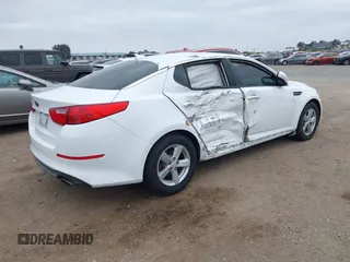 2014 Kia Optima LX with VIN 5XXGM4A72EG260072, listed as a IAAI auction lot 42109844 with 167,910 mi miles and . Bid and sale history available at carsss.com. Image 4.