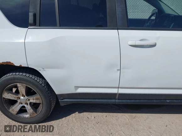 2016 Jeep Compass High Altitude with VIN 1C4NJDEB4GD767731, listed as a IAAI auction lot 41977400 with 99,890 mi miles and . Bid and sale history available at DreamBid. Image 20.