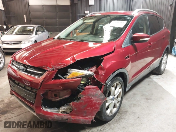 2014 Ford Escape Titanium with VIN 1FMCU9J9XEUD69589, listed as a IAAI auction lot 42031882 with 123,632 mi miles and . Bid and sale history available at DreamBid. Image 6.