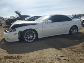 1998 Lexus SC 400 z VIN JT8CH32Y9W1001434, wystawiony jako Copart lot #44635385 z przebiegiem 125 440 mil mil oraz Szkody całkowita. Historia ofert i sprzedaży dostępna na DreamBid. Obrazek 1.