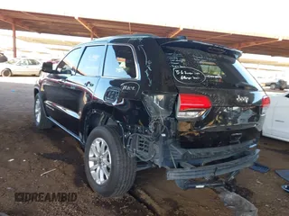 2014 Jeep Grand Cherokee Laredo with VIN 1C4RJEAG3EC472714, listed as a IAAI auction lot 40980100 with 124,603 mi miles. Bid and sale history available at carsss.com. Image 3.