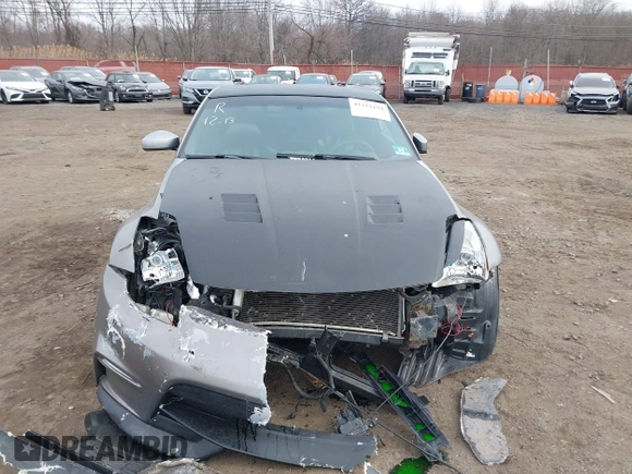 2003 Nissan 350Z Touring z VIN JN1AZ34E33T003711, wystawiony jako IAAI lot #41351191 z przebiegiem 167 503 mil mil oraz . Historia ofert i sprzedaży dostępna na DreamBid. Obrazek 12.