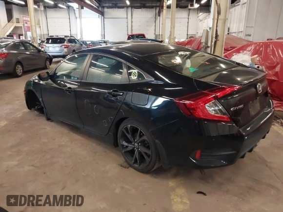 2019 Honda Civic Sport with VIN 19XFC2F89KE206213, listed as a IAAI auction lot 41804863 with 76,052 mi miles and . Bid and sale history available at DreamBid. Image 3.