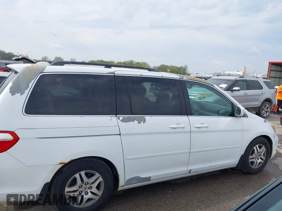 2007 Honda Odyssey Touring with VIN 5FNRL38887B081562, listed as a IAAI auction lot 42000435 with 238,287 mi miles and . Bid and sale history available at DreamBid. Image 14.