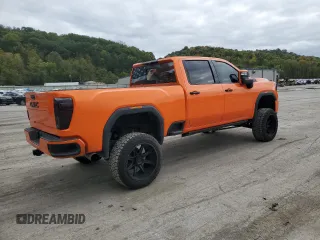 2021 GMC Sierra 3500HD Denali z VIN 1GT49WEY3MF113372, wystawiony jako Copart lot #74920824 z przebiegiem 26 900 mil mil oraz Szkoda całkowita • Salvage title. Historia ofert i sprzedaży dostępna na DreamBid. Obrazek 3.
