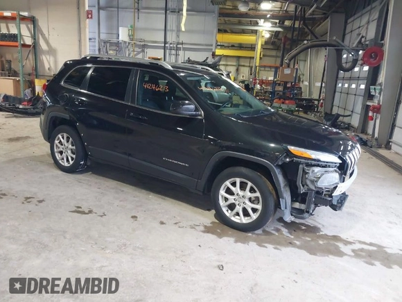 2015 Jeep Cherokee Latitude with VIN 1C4PJMCB5FW768854, listed as a IAAI auction lot 41246213 with 131,112 mi miles. Bid and sale history available at carsss.com. Image 1.