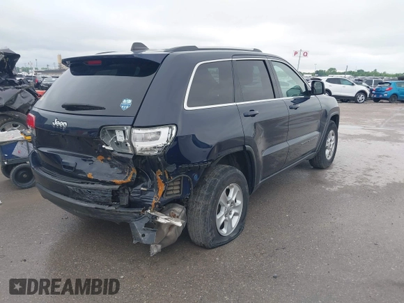 2017 Jeep Grand Cherokee Laredo with VIN 1C4RJFAGXHC912454, listed as a IAAI auction lot 42140735 with 138,895 mi miles and . Bid and sale history available at DreamBid. Image 4.