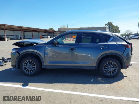2019 Mazda CX-5 Touring with VIN JM3KFACM1K0533142, listed as a IAAI auction lot 41880181 with Not Provided miles and . Bid and sale history available at carsss.com. Image 14.