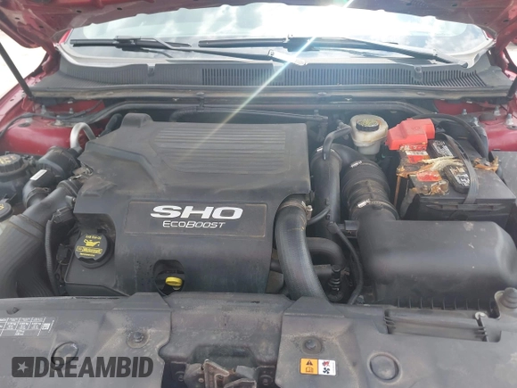 2014 Ford Taurus SHO with VIN 1FAHP2KT1EG133940, listed as a IAAI auction lot 42805214 with 141,204 mi miles and . Bid and sale history available at DreamBid. Image 10.