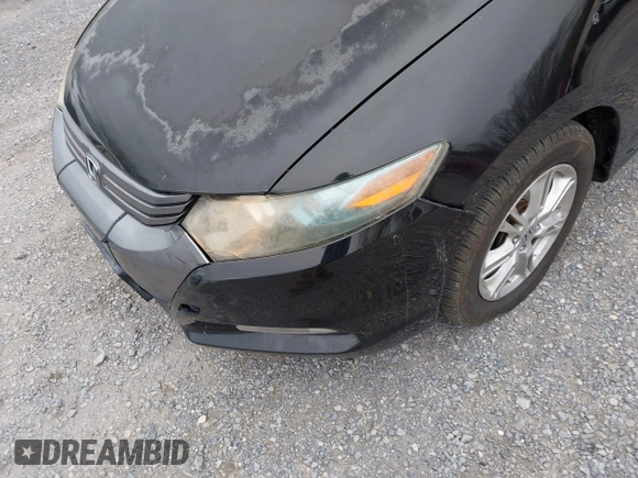 2010 Honda Insight EX with VIN JHMZE2H73AS002299, listed as a IAAI auction lot 41900761 with 251,934 mi miles and . Bid and sale history available at DreamBid. Image 6.