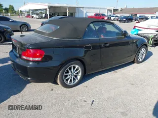 2011 BMW 1 Series 128i with VIN WBAUL7C55BVM81049, listed as a IAAI auction lot 41892811 with 50,659 mi miles and . Bid and sale history available at carsss.com. Image 4.