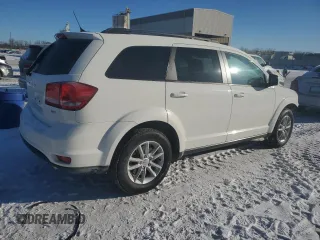 2014 Dodge Journey SXT with VIN 3C4PDCBGXET149847, listed as a Copart auction lot 45884035 with 131,121 mi miles and Salvage Title. Bid and sale history available at carsss.com. Image 3.