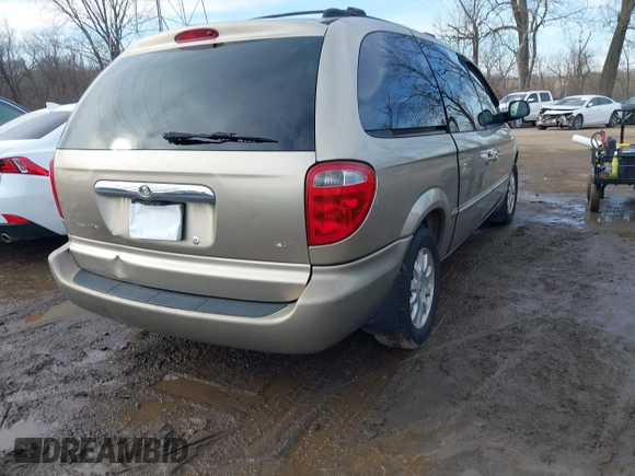 2002 Chrysler Town & Country EX with VIN 2C8GP74L62R524896, listed as a IAAI auction lot 41651240 with 128,983 mi miles and . Bid and sale history available at carsss.com. Image 3.
