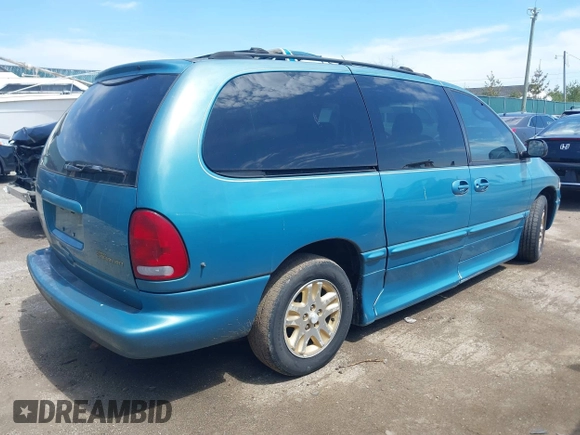 1996 Dodge Grand Caravan with VIN 1B4GP54R8TB458827, listed as a IAAI auction lot 42074872 with 97,566 mi miles and . Bid and sale history available at DreamBid. Image 4.