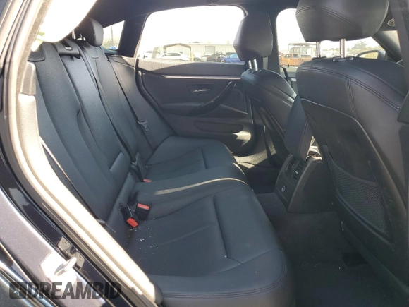 2016 BMW 4 Series 428i z VIN WBA4A9C59GG696298, wystawiony jako Copart lot #52348325 z przebiegiem 87 319 mil mil oraz Szkoda całkowita • Salvage title. Historia ofert i sprzedaży dostępna na DreamBid. Obrazek 10.