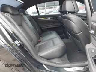 2015 BMW 7 Series 740i with VIN WBAYA6C54FG273188, listed as a IAAI auction lot 42563572 with 70,675 mi miles and . Bid and sale history available at DreamBid. Image 8.