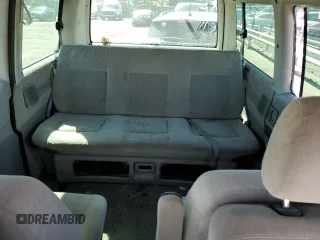 2000 Volkswagen EuroVan с VIN WV2MH4701YH133906, выставлен на аукционе Copart как лот 72370794 с пробегом Не указан миль и Чистый • Clean title. История ставок и продаж доступна на DreamBid. Изображение 10.
