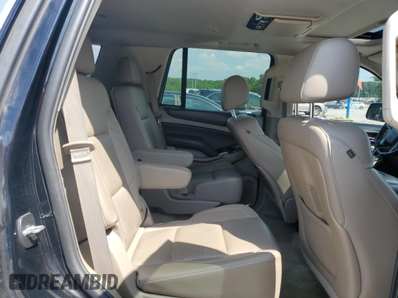 2015 Chevrolet Tahoe LTZ with VIN 1GNSCCKC2FR693500, listed as a Copart auction lot 60225195 with 206,210 mi miles and Salvage title. Bid and sale history available at DreamBid. Image 11.