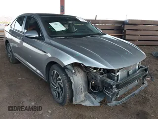2021 Volkswagen Jetta SEL Premium z VIN 3VWG57BU1MM045540, wystawiony jako IAAI lot #42339316 z przebiegiem 74 832 mil mil oraz . Historia ofert i sprzedaży dostępna na DreamBid. Obrazek 1.