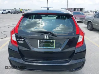 2020 Honda Fit LX z VIN 3HGGK5H45LM733449, wystawiony jako IAAI lot #42388666 z przebiegiem 28 064 mil mil oraz . Historia ofert i sprzedaży dostępna na DreamBid. Obrazek 16.