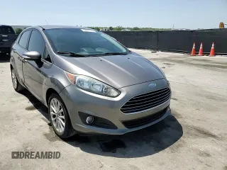 2014 Ford Fiesta SE z VIN 3FADP4BJ4EM110277, wystawiony jako Copart lot #56921115 z przebiegiem 126 536 mil mil oraz Szkoda całkowita • Salvage title. Historia ofert i sprzedaży dostępna na DreamBid. Obrazek 13.