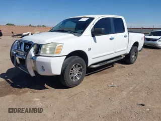 2004 Nissan Titan LE z VIN 1N6AA07B14N528418, wystawiony jako IAAI lot #42281318 z przebiegiem 200 902 mil mil oraz . Historia ofert i sprzedaży dostępna na DreamBid. Obrazek 17.