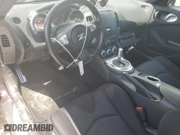 2012 Nissan 370Z Touring with VIN JN1AZ4EH9CM561796, listed as a Copart auction lot 60938314 with 59,011 mi miles and Salvage Title. Bid and sale history available at carsss.com. Image 8.