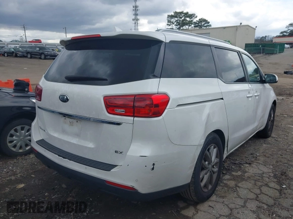 2021 Kia Sedona LX with VIN KNDMB5C11M6671063, listed as a IAAI auction lot 41951433 with 130,891 mi miles. Bid and sale history available at carsss.com. Image 4.