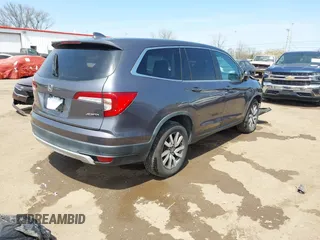 2019 Honda Pilot EX-L with VIN 5FNYF6H55KB082929, listed as a IAAI auction lot 42057611 with 93,532 mi miles and . Bid and sale history available at DreamBid. Image 4.